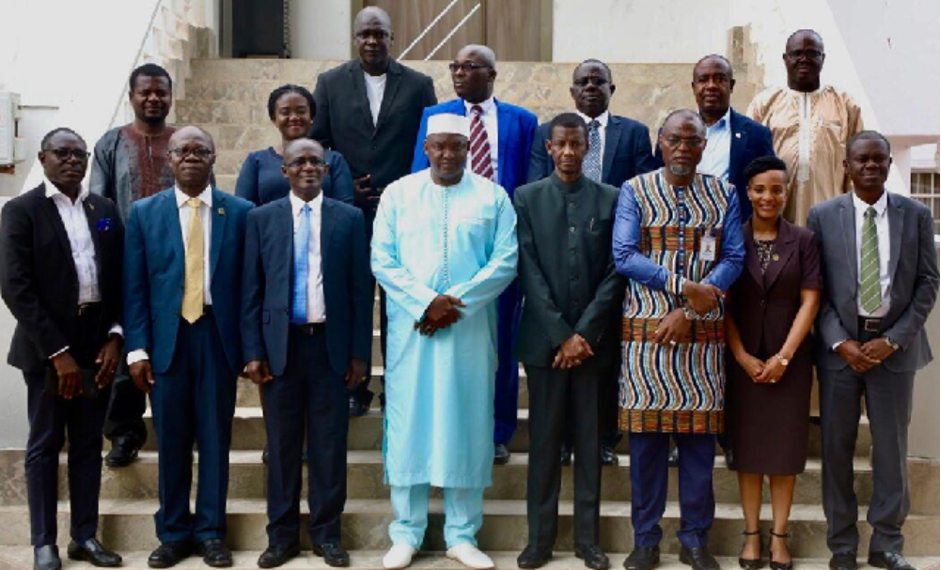 The delegation led by Prof. Kwasi Obiri-Danso (third from left) with Gambian President Adama Barrow (fourth from left) and late Minister of Higher Education, Hon. Badara A. Joof (fourth from right)