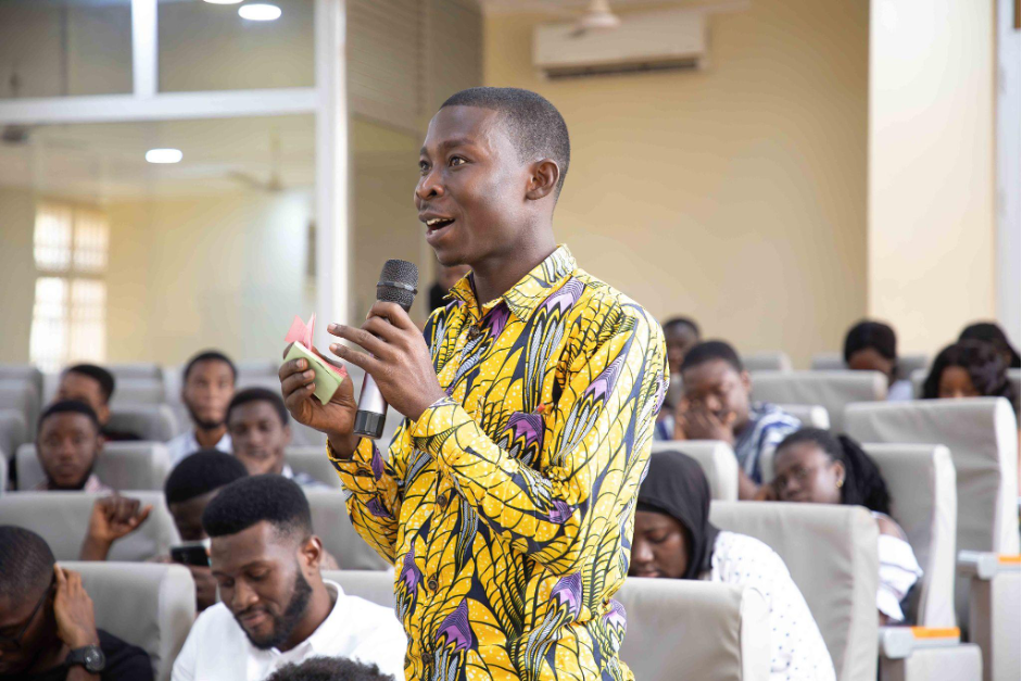 Participants engaged with the speaker after his presentation