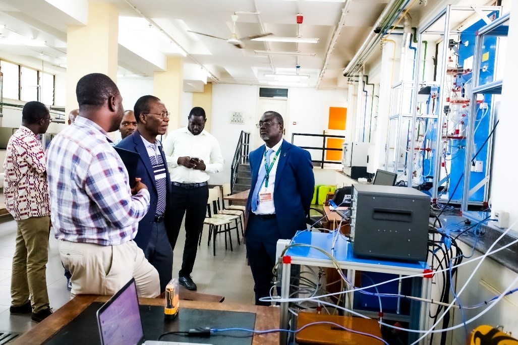 Prof. Yeboah's visit to the Chemistry laboratory. On the right is Dr. Emmanuel Awarikabi (Department of Chemical Engineering), and to his left is Prof. Kwabena Biritwum Nyarko (Provost, College of Engineering)