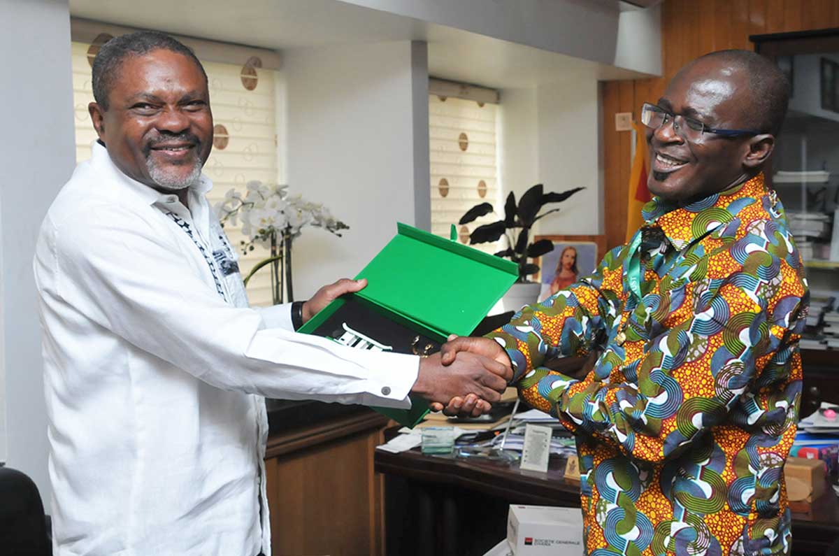 His Excellency Augusto da Silva Cunha (left), Receiving a Souvenir from Professor Kwasi Obiri-Danso, Vice-Chancellor, KNUST